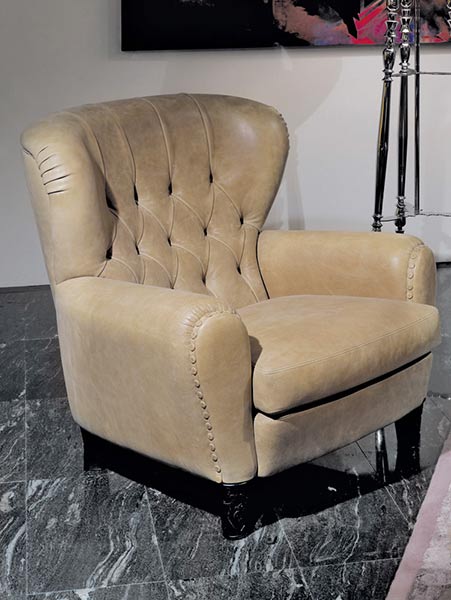 כורסא ויז'ון. כורסא עשויה עץ מרופד בדוגמת קפיטונא'ז בבד/עור הניתן לבחירת הלקוח. <br>רגליים ע"פ בחירת הלקוח. חנות BESTO.